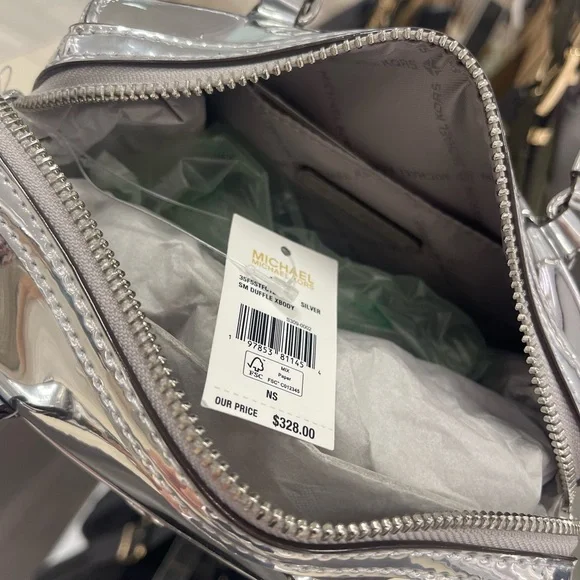 MICHAEL KORS Jet Set Small Patent Duffel Xbody Crossbody Bag
Silver 
NWT - Picture 8 of 16